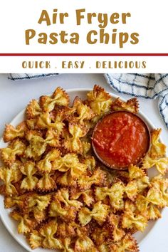 air fryer pasta chips on a white plate with ketchup and dipping sauce