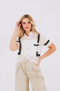 Take your style to the next level with the Higher Levels Top. This unique top features a stunning crochet design, 1 convenient pocket, and a bold color block point for added flair. Upgrade your wardrobe and stand out from the crowd with this must-have top. Details Crochet 1 pocket Color block point Sizing Approximate measurements: SIZE LENGTH BUST One Size 21" 42" Fabric has no stretchModel is 5’9 Material 100% CottonHand wash coldHang dry Short Sleeve Open Knit Crochet Top For Day Out, Trendy White Tops With Crochet Trim, Trendy White Top With Crochet Trim, Casual White Short Sleeve Crochet Top, White Open Knit Top With Relaxed Fit, White Open Knit Relaxed Fit Top, Trendy Crochet Top With Crochet Trim, Chic White Crochet Top For Day Out, Casual White Tops With Crochet Trim