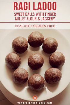 a white plate topped with chocolate balls covered in powdered sugar and text overlay reads ragi ladoo sweet balls with finger mill flour & jager healthy gluen free