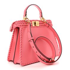 This is an authentic FENDI Vitello King Shiny Nappa Intreccio Small Peekaboo I SEE U Satchel in Pink Dalia. This stylish tote is crafted of smooth pink woven leather with woven leather detailing for trim. This bag features a leather top handle, an optional shoulder strap with gold hardware and a structured frame across the top secured by a turn lock on both sides. This opens to a matching brown suede interior with a patch pocket. Pink Dalia, Pokemon Fabric, Fendi Peekaboo Bag, Fendi Shoulder Bag, Leather Detailing, Fendi Peekaboo, Python Print, Shopper Tote, Blue Velvet