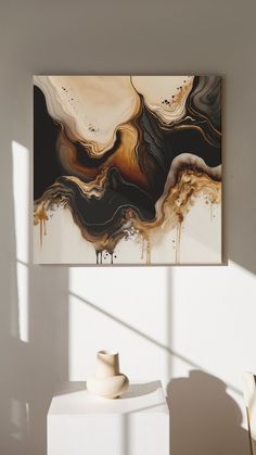 an abstract painting hangs on the wall above a white table with two vases in front of it