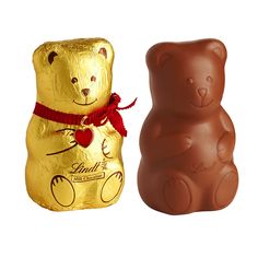 two chocolate bears are next to each other