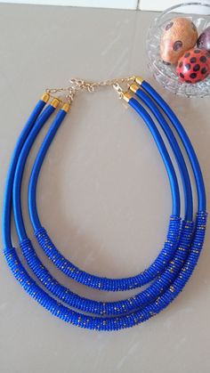 Blue African Beaded Necklace, Handmade Necklace, Women Jewelry, A set of Jewelry, Gift For Her, Maasai Tribal Necklace, Christmas A set of women jewelry which is superbly crafted. This set will make you stand out and can be worn in any occasion and outfit. You can purchase it as a whole set or as a single piece( i.e necklace,earrings or bracelets) Main color - Royal blue. **GET FREE SHIPPING FOR ADDITIONAL ITEMS PURCHASED. Yes, Buy Multiple Items and pay shipping for 1 item only- The rest ships Traditional Blue Beaded Necklaces For Party, Blue Beaded Necklaces With Large Beads For Festive Occasions, Festive Blue Beaded Necklaces With Large Beads, Festive Blue Necklaces With Large Beads, Festive Blue Beaded Necklace With Large Beads, Festive Blue Necklace With Large Beads, Festive Blue Jewelry With Large Beads, Blue And Gold Beads For Gifts, Blue Beads With Gold Details As A Gift