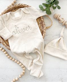 This sweet little boy outfit is perfectly simple. This features a soft oatmeal romper, with a sweet vintage stitched name in sage. You can also choose a knotted hat in oatmeal. This outfit makes a perfect coming home outfit, newborn pictures, or baby shower gift.  Name is stitched in lowercase only.  Preemie 5-7lbs (mis-tagged as newborn) Newborn fits approximately 6-9lbs 0/3 fits approximately 9-13lbs Please leave name(s) in the notes to seller box at checkout. If you have any concerns at all, Outfit Baby Shower, Baby Coming Home Outfit, Middle Names, Personalized Newborn, Newborn Hospital, Girls Coming Home Outfit, Going Home Outfit, Coming Home Outfit