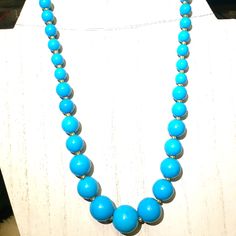 Bold Solid Sky Blue Magnesite Turquoise, No Matrix Solid Sky Blue Graduated Round Beads. Vibrant And Classy Elegant Blue Jewelry With Wooden Beads, Turquoise Jewelry With Round Wooden Beads, Turquoise Jewelry With Wooden Beads, Blue Wooden Beads For Jewelry Making, Elegant Blue Turquoise Necklace With Colorful Beads, Elegant Turquoise Necklace With Large Blue Beads, Turquoise Necklace With Large Round Beads, Turquoise Necklace With Large Beads, Elegant Large Beads Turquoise Necklace