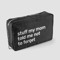 a black toilet bag that says stuff my mom told me not to forget