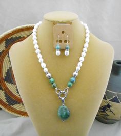 Handmade and designed by seller, beautiful large fresh water pearls with turquoise and a large turquoise pendent, silver metal clasp, that hooks in the front.  Necklace length is 20 inches, the pendent measures 2 1/4 inches including the bail, the width is 1 1/8 inch.   The earrings are 1 1/2 long, made with 8mm turquoise beads and 10mm fresh water pearls. Acrylic Nails Yellow, Necklaces Ideas, Large Bead Necklace, Stone Bead Jewelry, Turquoise Choker, Bridal Jewellery Design, Water Pearls, Diy Crafts Jewelry, Turquoise Beads