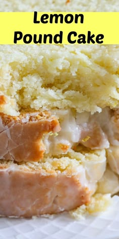 a lemon pound cake is cut in half and sitting on a plate with the rest of it