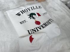 Christmas Sweatshirt, Christmas Whoville University Embroidered Sweatshirt, Christmas Embroidery Sweatshirt, Christmas Crewneck 90% cotton, 10% polyester * Unisex Hoodies fits men & women great. * All sizes are available in the following (S, M, L, XL, 2X, 3X) If needed larger or smaller please send us a quick email to get it in stock for you. * Your custom Artwork/LOGO is digitally digitized and embroidered with best in class embroidery machines. * THE PERFECT GIFT: Many of our designs make thes White Tops With Custom Embroidery For Christmas, White Christmas Tops With Embroidered Graphics, White Top With Embroidered Logo For Christmas, White Tops With Embroidered Logo For Christmas, White Hoodie With Embroidered Text For Winter, Winter White Hoodie With Embroidered Text, White Winter Hoodie With Embroidered Text, Winter White Sweatshirt With Embroidered Text, Christmas Whoville