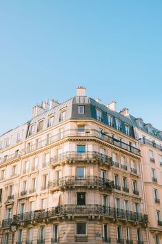 an apartment building with balconies and windows on the top floor in paris, france