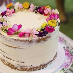 the cake is decorated with flowers and has been posted on instagram for more than two years