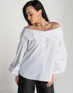 Blouse of a flat silhouette, with open shoulders, made of shirting fabric.Along the neckline, there is a beautiful turn-down collar that fastens with two hidden buttons.Front fastening with buttons, long sleeve with elastic.Product parameters:XS: waist - 57.5 cm, hips - 58.8 cmS: waist - 59.5 cm, hips - 60.8 cmM: waist - 61.5 cm, hips - 61.8 cmML: waist - 63.5 cm, hips - 63 cmL: waist - 65.5 cm, hips - 64 cmThe length of the product on the back is 72 cm. Sleeve length - 68 cm. The model is weari Chic Summer Shirt With Fold Down Collar, Summer Daywear Tops With Fold Down Collar, Chic Cotton Blouse With Spread Collar, Spring Daywear Blouse With Fold Down Collar, Chic Summer Blouse With Fold Down Collar, Chic Fold Down Collar Summer Blouse, Chic Fold Down Collar Blouse For Summer, Chic Cotton Blouse With Fold Down Collar, Chic Office Tops With Spread Collar