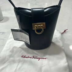 Salvatore Ferragamo Bag, Shoulder Bag, Black, Nwt Designer Satchel Bucket Bag For Office, Designer Bucket Shape Shoulder Bag, Designer Bucket Bag With Branded Hardware, Designer Bucket Shape Shoulder Bag With Detachable Handle, Designer Bucket Bag With Removable Pouch, Designer Office Bucket Bag, Designer Travel Bucket Bag With Branded Hardware, Luxury Satchel Bucket Bag With Branded Hardware, Luxury Bucket Bag Satchel With Branded Hardware