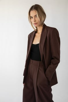 Bianca, is an oversized blazer with a menswear inspired fit. Chocolate - 65% Polyester / 15% Wool / 10% Cotton Lined. Dry clean only. Darina is 5'11 / 180 cm and wearing a size 1 which is equivalent to a size small. This item is Final Sale. Dark Brown Suit Women, Suits Dark Academia, Plum Blazer Outfit, Chocolate Brown Dress Outfit, Brown Suit Women's, Dark Brown Blazer Outfit, Chocolate Outfit, Brown Blazer Outfit, Model Blazer