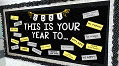 a bulletin board with sticky notes attached to it that says, this is your year to