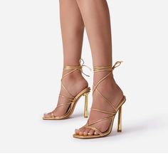 Gold Heels With Lace Up Detailing Gold High Heel Spring Heels, Gold Lace-up Sandals For Evening, Spring Gold Heels With Reinforced Heel, Gold Strappy Heels For Spring, Gold Lace-up Heels For Formal Occasions, Gold Prom Shoes, Gold Lace Up Heels, Gold Chunky Heels, Ribbon Heels