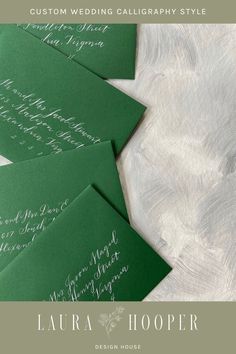 four green envelopes with calligraphy on them and the words, custom wedding calligraphy style