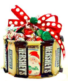 hershey's christmas candy gift basket with santa clause ribbon and polka dot bow