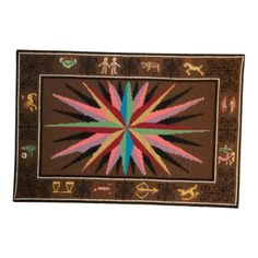 a brown rug with a colorful star design on it