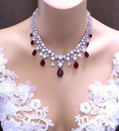 "Tarnish resistant white gold plated metal framed teardrop swarovski siam red crystal rhinestone drop. cubic zirconia all around. This spectacular bridal necklace with pear and round cubic zirconia has the look of real couture jewelry. the necklace is 15.5\" long. Perfect for brides, pageants, or prom! Please inquire about longer size. Available in different color crystal. Please inquire. :) Set/bulk discounts available. Please inquire." Jewelry Prom, Rhinestone Rose, Wedding Bridesmaid Jewelry, Prom Jewelry, Wedding Bridal Jewellery, Couture Jewelry, Pretty Bracelets, Wedding Jewellery Necklace, Clear White