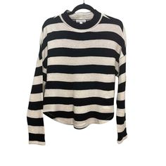 Socialite Women's Black/Ivory Striped Mock Neck Dolman Sweater Size M. Stay cozy and comfy in this dolman sleeve pullover sweater. Mock neck. Long dolman sleeves
Pullover style - Allover stripe print - Knit construction. 95% acrylic, 5% spandex
Approximate Flat Lay Measurements Armpit to Armpit: 22.5". Shoulder to Hem: 23"
KSW603251-NR. Made in China. Cream Funnel Neck Top For Fall, Casual Funnel Neck Long Sleeve Top For Fall, Cream Long Sleeve Top For Fall, Dolman Sweater, Dolman Sleeve, Stripe Print, Pullover Styling, Mock Neck, Sweater Outfits