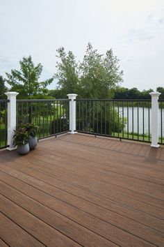 Bring the character-rich look and feel reclaimed wood to your backyard with the TimberTech Reserve Collection. The bold, multi-tonal colors and rustic cathedral grain pattern will look great for years to come without cracking, peeling or warping - all with practically no maintenance from you TimberTech Reserve 1-in x 6-in x 12-ft Dark Roast Grooved Composite Deck Board in Brown | RCGV5412DR-FR Rustic Deck Ideas, Two Tier Deck Ideas, Deck Board Patterns, Deck Farmhouse, Composite Deck Ideas, Painted Decks, Deck Redo, Deck Stains, Composite Decking Designs