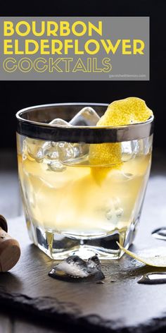 the bourbon elderflower cocktail is garnished with ice and lemon