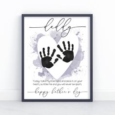 a black and white poster with two hands in the shape of a heart that says, dad