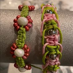 I Created These Two Macram Bracelets Using Seed Beads Glass Beads, And Metal Beads. One Of Them Is A Fancier Macram Bracelet Which I Love! I Have So Much Jewelry And I’ve Got To Put It All On Poshmark! I Also Take Special Orders. The Pink Flower Bracelet Will Fit A Wrist Up To A Size 6 Inches And The Pink And Green One Will Fit A Wrist Up To A 8 Inches. Pink Braided Bracelets With Colorful Beads As Gift, Pink Beaded Braided Bracelet For Friendship, Pink Round Beads Braided Casual Bracelets, Casual Pink Braided Bracelets With Round Beads, Casual Pink Braided Bracelets With Colorful Beads, Pink Braided Bracelets With Round Beads, Bohemian Pink Beaded Bracelets With Macrame, Adjustable Pink Braided Bracelet With Colorful Beads, Pink Macrame Bracelets For Friendship