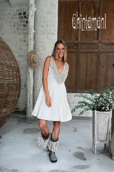 "⫸ We ship by EXPRESS EMS now for fast & safe delivery! Tiered Midi Dress with Fringes is another playful addition to our Boho Alma Libra collection. Gorgeously feminine and so pleasant to wear, it will look amazing with heeled sandals or our ethnic canvas boots. Stunning long linen fringe on the neckline complete the Boho Chic look. Open back and midi length adds the charm and makes it even more suitable for hot and lazy summer days. It is very floaty by design. Light, soft and natural bamb White Ruffled Dress For Festivals, Bohemian Cotton Party Dress, Cotton Ruffle Dress For Festivals, Cotton Ruffled Dress For Festivals, Cotton Festival Dress With Ruffles, Boho Wrap Dress, Fringe Midi Dress, Dress Goddess, Organic Clothing Women