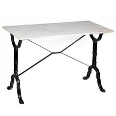 a white table with black legs and a marble tabletop on the top, against a white background