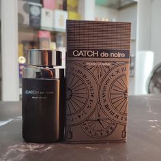 Fragrance World Catch De Noire Pour Homme Top notes of pineapple, bergamot, black currant, and apple. The heart notes are birch, patchouli, Moroccan jasmine, and rose. The base notes of musk, oak moss, ambergris, and vanilla. Contact us @ Call/WhatsApp: 08098568331 http://perfumesforlessng.com Nationwide Delivery Or walk in at our store situated @ Sovs Plaza, 17 Badore Rd, Adewale Bustop, Badore Ajah, To Place your order. Black Currant, Black Currants, Heart Notes, Call Whatsapp, Walk In, Pineapple, Quick Saves