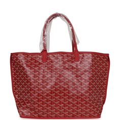 This Goyard Red Anjou PM Bag is in Goyardine Canvas with palladium hardware, tonal stitching, red Chevroches Calfskin lining, and a detachable red coin purse.This bag is reversible.Origin: FranceCondition: New and never wornAccompanied by: Goyard dustbag, retail UPC, removable pouchMeasurements: 18.5" x 11" x 5.9" ; 7.5" shoulder strap Red Luxury Bags With Leather Handles, Luxury Red Bags With Leather Handles, Luxury Red Shoulder Bag With Palladium Hardware, Red Travel Bags With Palladium Hardware, Red Tote Bag With Palladium Hardware, Red Tote Shoulder Bag With Palladium Hardware, Red Shopping Bags With Palladium Hardware, Luxury Red Bags With Leather Lining, Luxury Red Shoulder Bag For Everyday