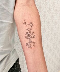 a person with a tattoo on their arm