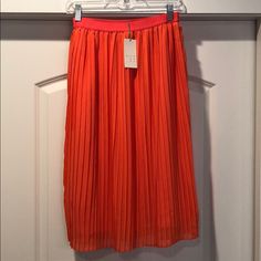 Midi Length (Hits Below The Knees, About Mid Shin). Beautiful Spring Bright Coral Color Spring Orange Skirt With Elastic Waistband, Orange Pleated Skirt For Spring, Red Pleated Skirt For Spring, Spring Orange Pleated Skirt, Orange Lined Midi Skirt, Orange Cotton Knee-length Midi Dress, Orange Midi Skirt, High Waisted White Skirt, Pleaded Skirt