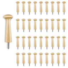 a bunch of wooden screws and nails on a white background