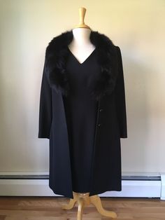 Vintage ALBERTO MAKALI Sleeveless Black Dress & Fox Fur Trim Jacket Ensemble - Size 8 Excellent pre-owned condition.   Dress Measurements: Chest (armpit to armpit) 17.5" Waist (across) 15" Length (shoulder to bottom hem) 35" Jacket Measurements: Chest (armpit to armpit) 19" Waist (across) 16" Length (shoulder to bottom hem) 37" Sleeves (shoulder seam to sleeve end) 22.5" It doesn't get much classier than this.  Rare find! Fitted A-line Party Outerwear, Elegant Fitted Outerwear For Vintage Fashion, Elegant Fitted Vintage Fashion Outerwear, Elegant Fitted Outerwear For Costumes, Elegant Spring Costume Outerwear, Fitted Sleeveless Vintage Outerwear, Vintage Fitted Sleeveless Outerwear, Fur Trim Jacket, Black Fur Coat With Faux Fur Trim