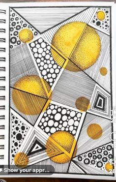 an art journal with yellow and black designs on it, next to a pencil drawing