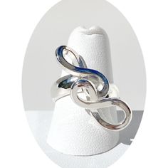 The dome unique band ring collection is the perfect accessory to complement any personal style. Each ring is designed with the worlds finest silver, Argentium. The dome bands beautifully displays each textured and molten designs. Every ring comes with a fancy gold trim ring box, white gift box and Sunshine cleaning cloth. For custom pieces email or text Lisa Ramos - 925-301-9600. What makes this MONOLISA ring unique? It is a one of a kind ring that isn't casted - pouring molten metal into molds Molten Metal, Worlds Finest, Unique Bands, Ring Collection, Argentium Silver, White Gift Boxes, Ring Unique, Ring Collections, Handmade Design