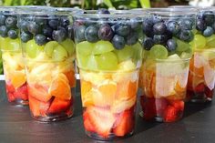 several cups filled with different types of fruit