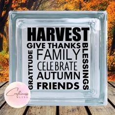 a glass block that says harvest give thanks and family celebrate autumn with friends on it