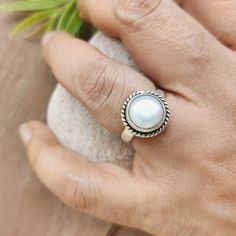 * Product Information Natural Pearl Ring, Handmade Silver Ring, 925 Sterling Silver Ring, Round Fresh Water Pearl Ring, June Birthstone Promise Ring Gift for her ✦ M E T A L : Sterling Silver 925 Handmade item Materials: Silver, Stone Gemstone: Pearl Gem color: White Band color: Silver Style: Boho & Hippie ✦ S T O N E : Fresh Water Pearl ✦ B I R T H S T O N E : June Description Indian Pearl Silver Ring, Gemstone Pearl Jewelry,925 Sterling Silver Ring Indian Jewelry, Silver Ring, Christmas Gift. Everyday White Rings Stamped 925, Everyday White 925 Stamped Rings, Sterling Silver Pearl Birthstone Ring, Sterling Silver Pearl Ring Gift, Everyday Silver Pearl Ring, Sterling Silver Pearl Ring Stamped 925, Sterling Silver Pearl Ring With Gemstone, Adjustable Stackable Round Pearl Ring, Adjustable Pearl Birthstone Ring