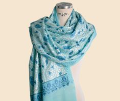 Elegant fine wool shawl in sky blue with a white and blue embroidery of the classic paisley pattern. + Dress it up for a wedding, ceremony or formal event. Light, comfortable and easy to combine. + A unique, elegant and exclusive piece. + Composition:       100% pure wool Size:                       76cm x 215cm + Hand wash in warm water + This item is shipped from Spain + Note that the colors of the original product may vary slightly from those you see on the computer screen. For any questions Formal Blue Dupatta With Chikankari Embroidery, Formal Blue Chikankari Embroidery Dupatta, Formal Blue Chikankari Embroidered Dupatta, Elegant Blue Shawl For Festive Occasions, Blue Embroidered Shawl With Traditional Drape, Blue Embroidered Shawl In Traditional Drape, Blue Pashmina Shawl For Wedding With Traditional Drape, Blue Pashmina Shawl With Traditional Drape, Blue Shawl For Wedding And Festive Occasions