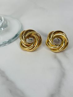 Elevate your everyday style with the timeless Janet Spiral earrings from Shades of Beautii Boutique. These handpicked collection features jewelry essentials that effortlessly enhance your daily look. Crafted with precision and passion, these earrings are designed to make a statement while providing you with the versatility you crave. Embrace the perfect blend of style and simplicity today. Spiral Earrings For Everyday Wear, Modern Tarnish Resistant Earrings For Gift, Modern Twisted Earrings As A Gift, Modern Twist Tarnish Resistant Earrings For Gifts, Swirl Earrings For Pierced Ears, Modern Twist Tarnish Resistant Twisted Earrings, Modern Twist Round Earrings, Twisted Metal Earrings With A Modern Twist, Modern Twist Round Metal Earrings