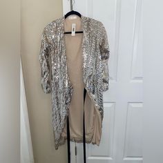 Shop sb08242's closet or find the perfect look from millions of stylists. Fast shipping and buyer protection. Never worn! Tags on! Ziela brand Party and special occasion sequin cardigan jacket. Metallic Winter Party Outerwear, Metallic Outerwear For Winter Party, Metallic Outerwear For Party In Winter, Metallic Outerwear For Fall Party, Glamorous Metallic Long Sleeve Outerwear, Metallic Sequined Outerwear For Party, Metallic Sequined Party Outerwear, Metallic Sequin Party Outerwear, Glamorous Metallic Outerwear For Party