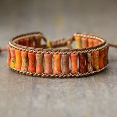 Bohemian Orange Bangle Bracelet, Orange Bohemian Bangle Bracelet, Bohemian Orange Bracelets For Festivals, Orange Bohemian Bracelets For Festivals, Bohemian Orange Beaded Bangle Bracelets, Bohemian Orange Beaded Bangle Bracelet, Orange Bohemian Beaded Bangle Bracelet, Brown Bohemian Beaded Bracelet, Bohemian Orange Hand-strung Bracelets