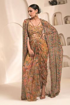 Yellow and multi colored printed cape with hand embellishments. Comes with coordinating draped dhoti skirt and hand embellished bustier. - Aza Fashions Floor-length Digital Print Dupatta For Party, Designer Multicolor Pre-draped Saree, Party Floor-length Digital Print Dupatta, Bollywood Style Party Dupatta With Digital Print, Hand Embellished Pre-draped Saree For Designer Wear, Bollywood Style Hand Embellished Pre-draped Saree For Festivals, Multicolor Digital Print Georgette Lehenga, Festive Party Dupatta With Digital Print, Party Dupatta In Georgette With Digital Print