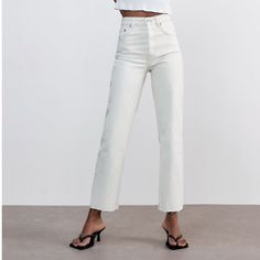 Chic White Cropped Jeans, Chic White Flare Jeans, White Jeans With Button Closure For Fall, White Mid-rise Jeans With Button Closure, White Jeans For Day Out, White Jeans For Fall Day Out, White High Rise Jeans With Button Closure, Chic High Waist White Jeans, Chic White High Waist Jeans