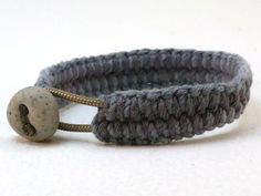 "A subdued blend of navy and dark grey cotton are hand loomed into this slender cuff. Tapered edges lay flat. A handsome addition to any wardrobe. Secured with a granite clay button and loop. 7\" (178 mm) inside circumference 5/8\" (16 mm) wide There is only one of these available in this particular combination of color and size so if you want this but it's not quite right for you please ask to have something custom made. This unique design is one of a series of slender hand loomed bracelets. Se Handmade Gray Bracelets For Everyday, Everyday Handmade Gray Bracelets, Casual Gray Bracelets For Everyday, Handmade Casual Gray Bracelets, Handmade Casual Gray Bracelet, Casual Handmade Gray Bracelets, Casual Gray Handmade Bracelet, Sailor Knot Bracelet, Sailor Bracelet