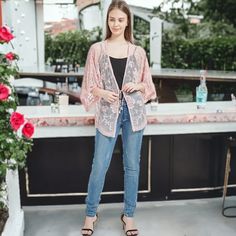 Add a touch of boho flair to your outfit with the Anna-Kaci Women's Short Embroidered Lace Duster Crop Cardigan with Half Sleeves. Blending just the right amount of and modesty, this lace duster keeps your arms and shoulders covered while allowing your outfit to shine through with its sheer lace design. The loose fit, open front, and extra-large armholes ensure a comfortable fit for any body type, creating a dramatic and head-turning flowy look as you walk by. Embroidered Open Front Cardigan, Spring Floral Embroidery Open Front Cardigan, Spring Bohemian Embroidered Cardigan, Bohemian Floral Embroidered Cardigan, Embroidered Beach Cardigan, Pink Embroidered Summer Outerwear, Non-stretch V-neck Bohemian Cardigan, Non-stretch Bohemian V-neck Cardigan, Lace Duster